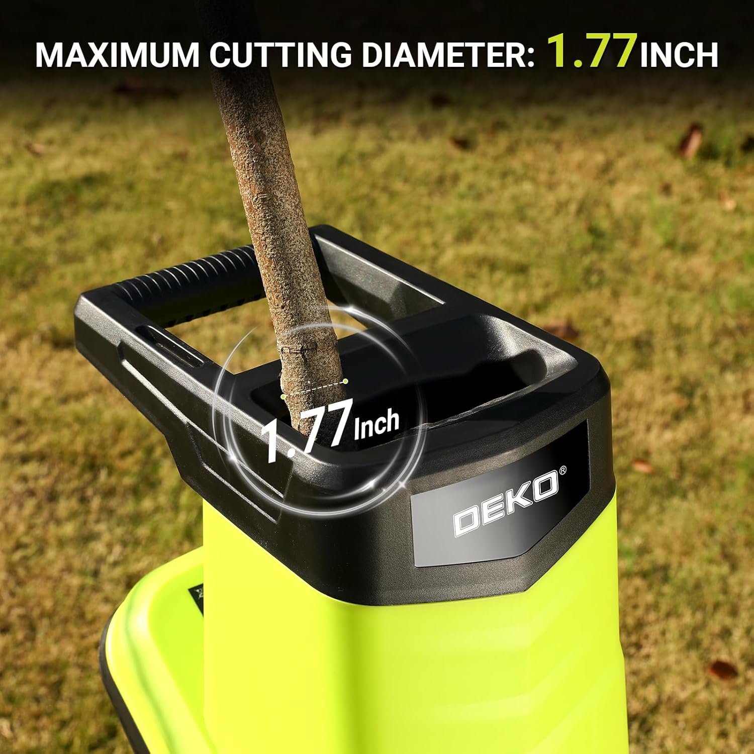Close-up of a branch being fed into the DEKOPRO Electric Garden Shredder hopper, showing maximum cutting diameter of 1.77 inches