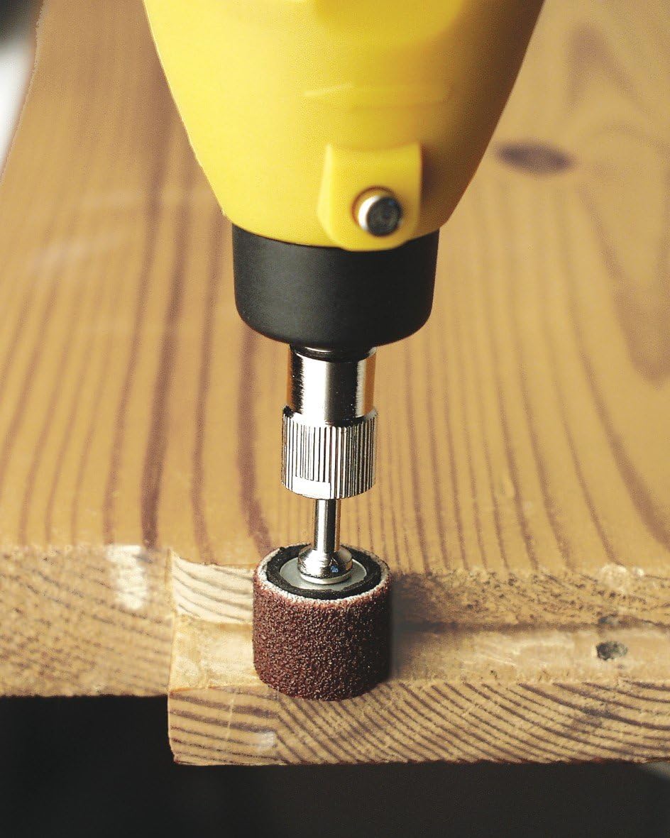 Mini drill sanding wood with a sanding band