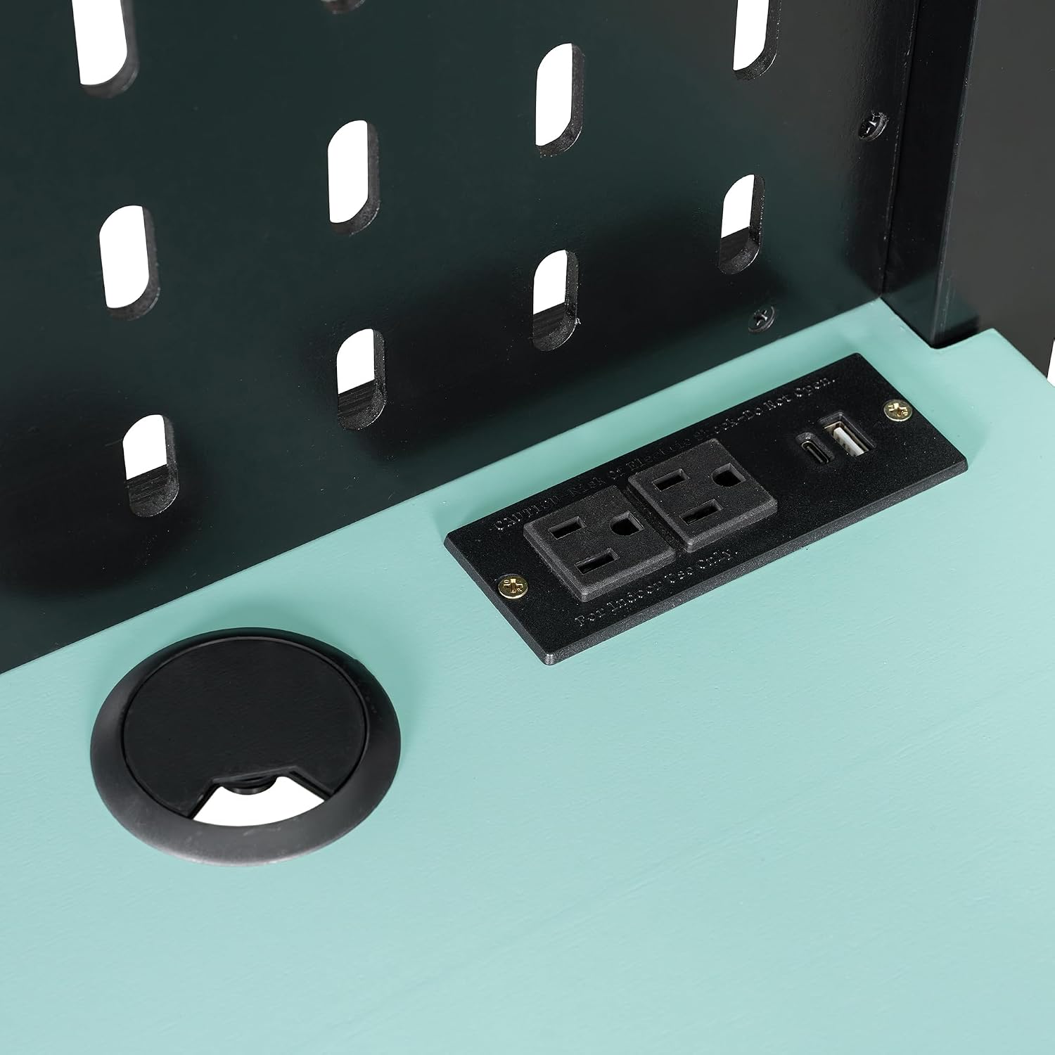 Close-up of the power outlet and USB ports on the desk of the VilroCaz Gaming Loft Bed