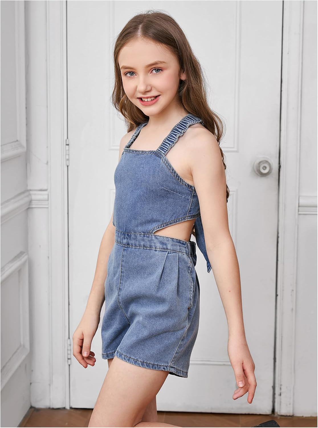 OYOANGLE Girl's Cute Denim Romper Criss Cross Backless Bow Jean Short Jumpsuits Summer Outfits