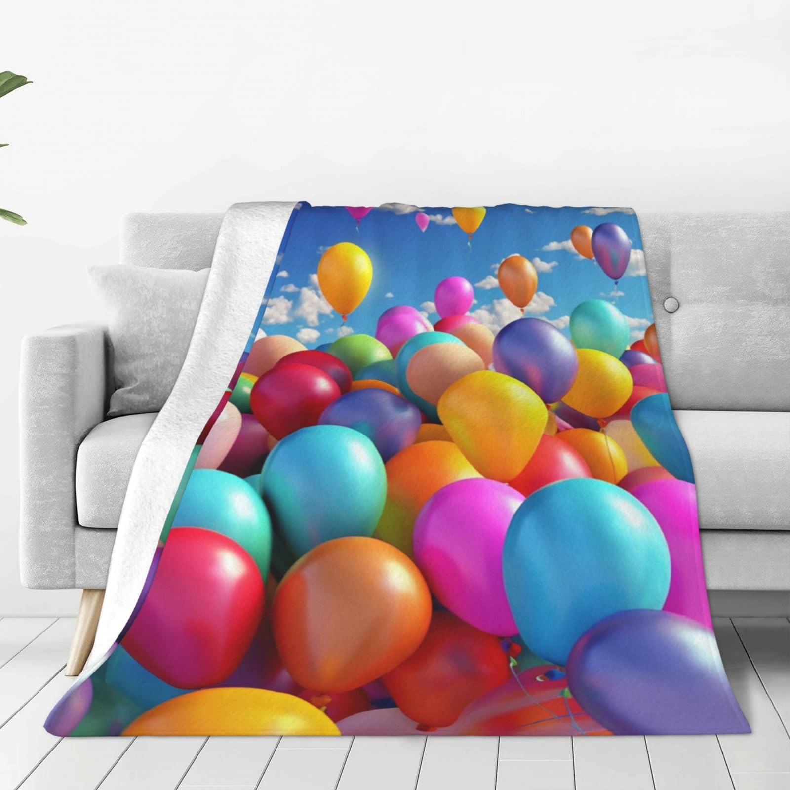 Couverture confortable en flanelle à motifs de ballons pour canapé