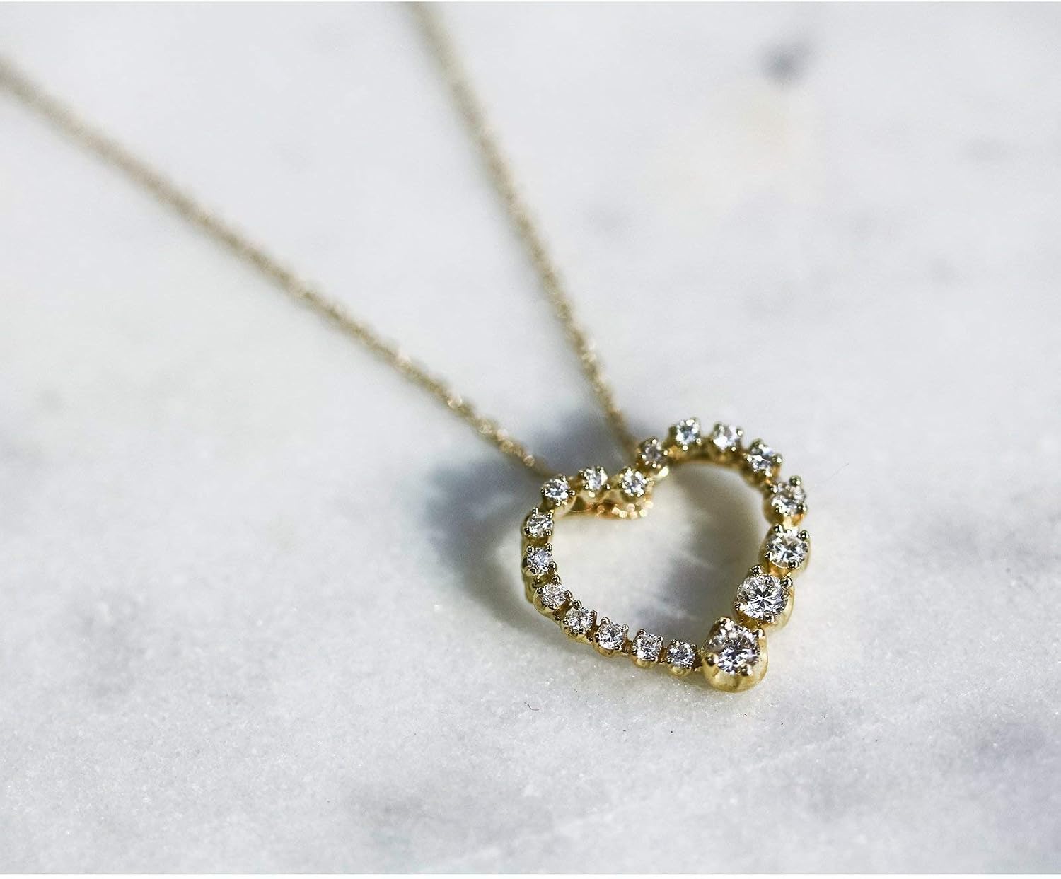 Kobelli Diamond Journey Heart Pendant 1/4 CTW 10k Yellow Gold