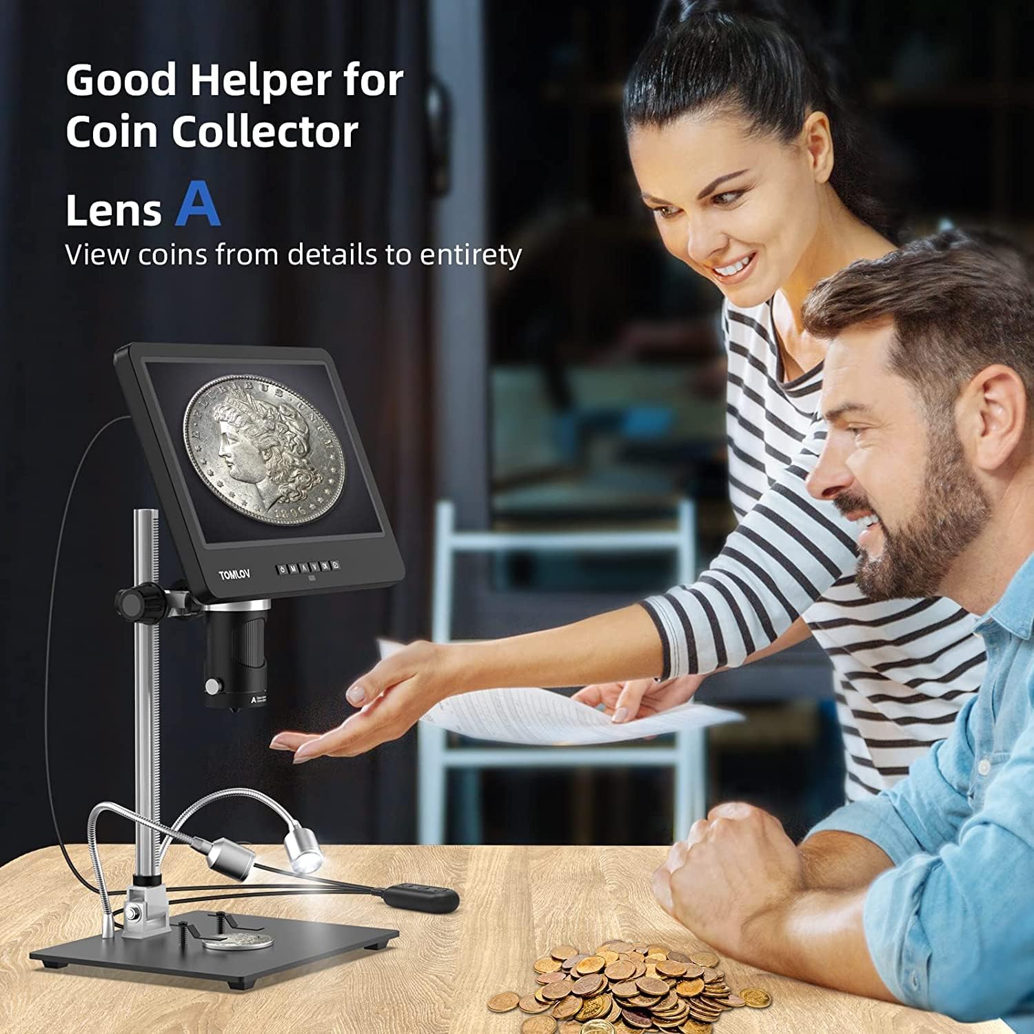 Two people examining a coin under the microscope with A-Lens
