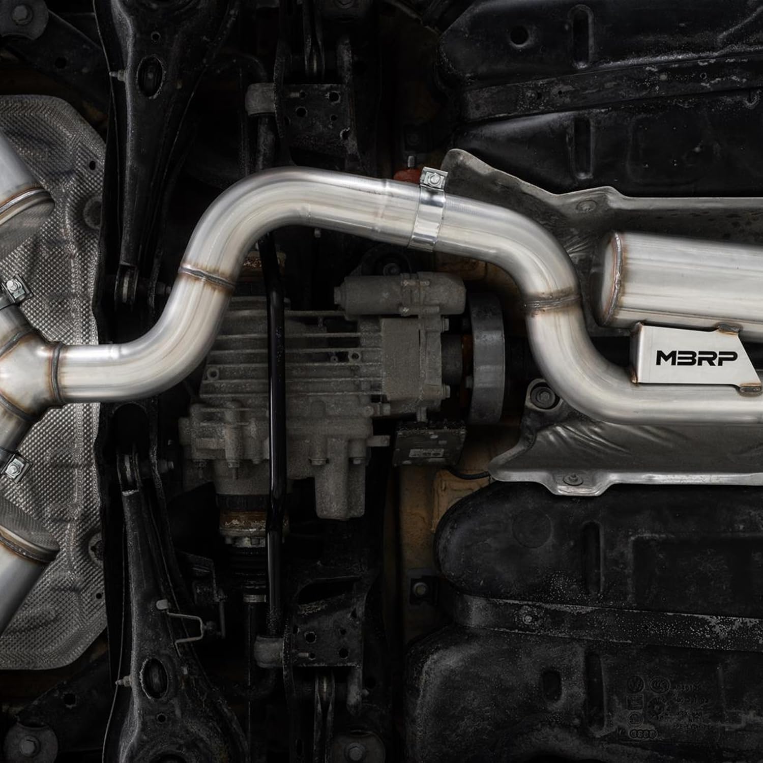 MBRP exhaust system installed underneath a vehicle, showing the tail pipe component.