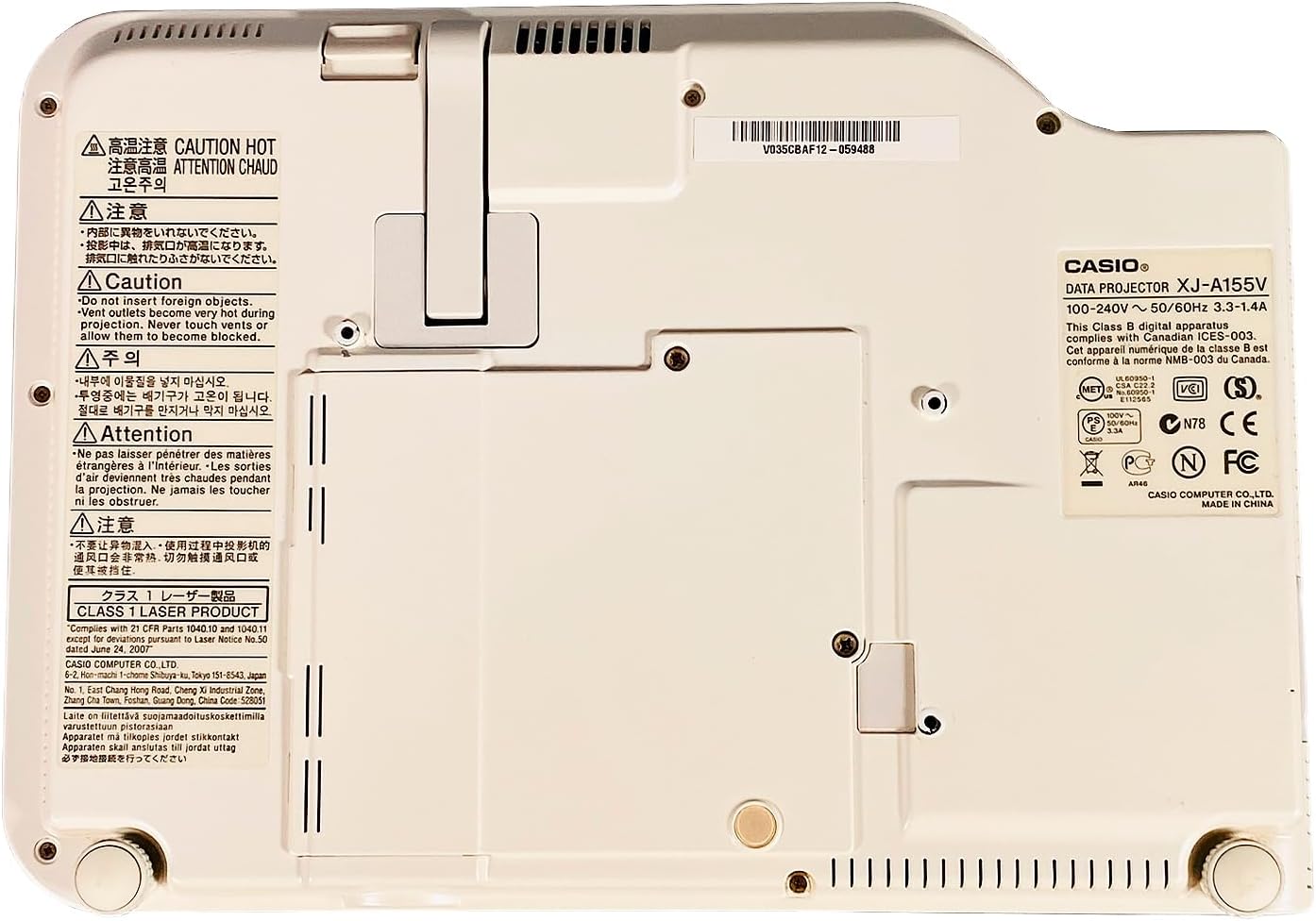 Close-up of the Casio XJ-A155V product label, showing model number, power requirements, and compliance information.