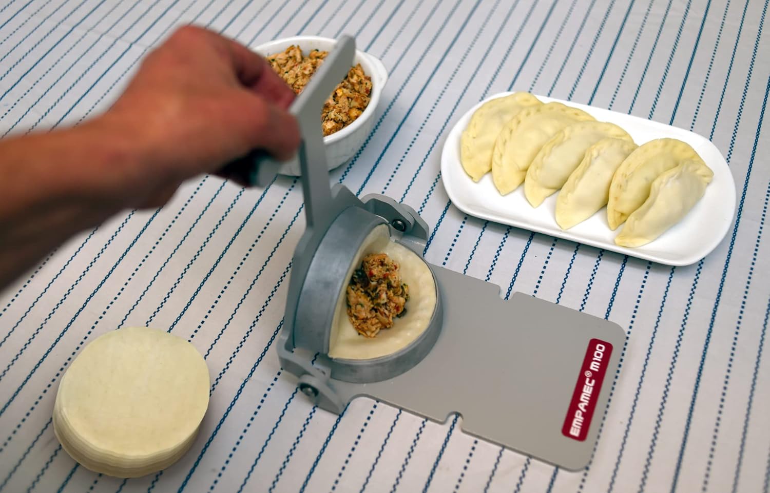 Empanada Maker EMPAMEC dough size diameter 5” (13 Cm) TO BE USED WITH WHEAT FLOUR (Harina de trigo) Makes 100 empanadas per hour. Close and stamp on a professional way.