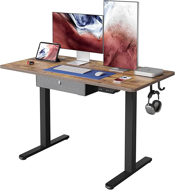FEZIBO Electric Height Adjustable Standing Desk with Drawer, 120 * 60cm Splice Board, Black Frame/Rustic Brown Top