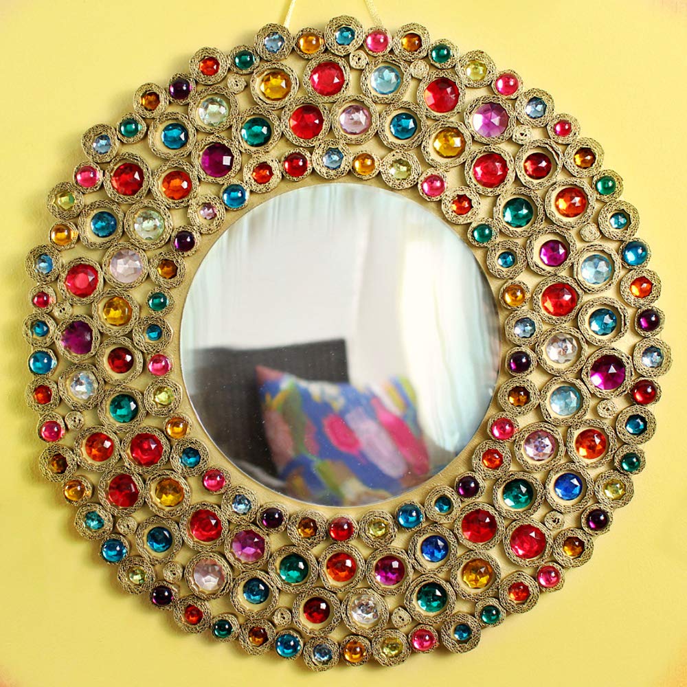 Finished craft project: a mirror decorated with colorful gems, likely using E6000 QuickHOLD