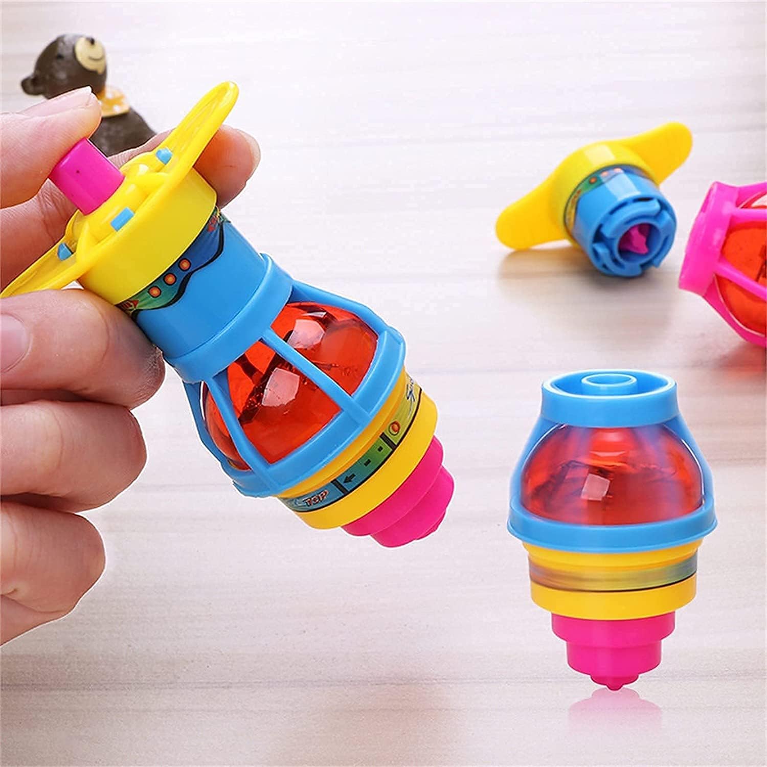 LED Light Up Flashing UFO Spinning Tops with Gyroscope, Colorful Ejection Flash Luminous Top Toy, Sensory Party Favors Birthday Gifts For Kids Toys