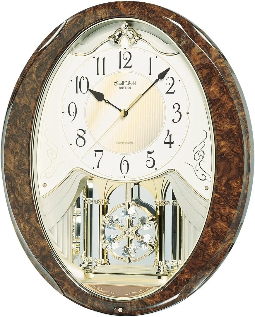 Amazon Com Rhythm Clock Small World Melody Amuse Radio Clock Small World Proud Tea Metallic Color 4mn523rh06 Home Kitchen