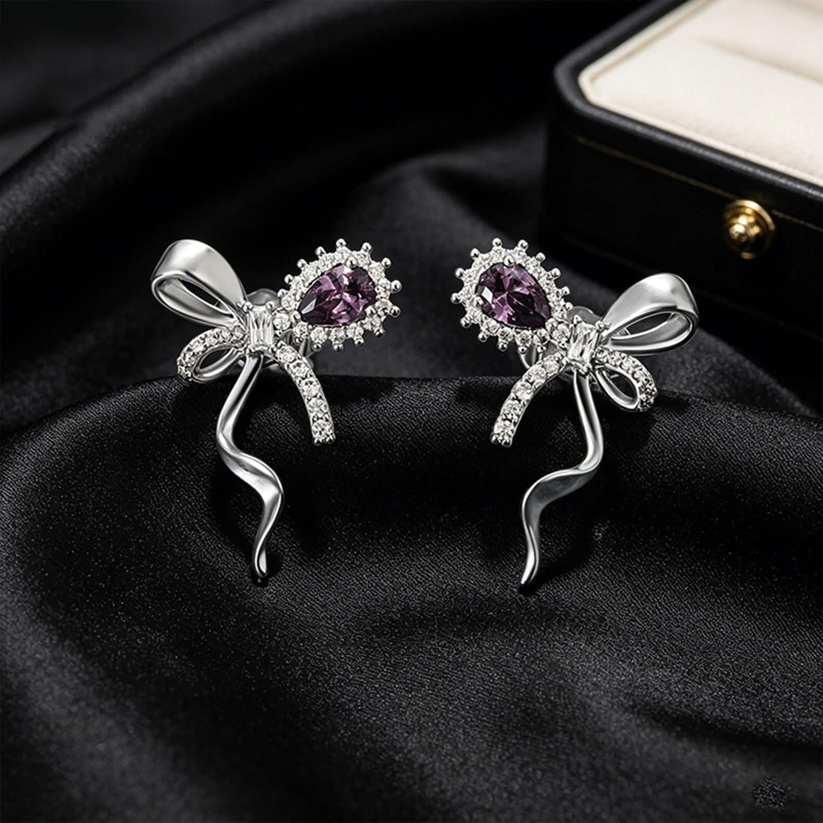 Pendientes con nudo de mariposa, amatista y moissanita