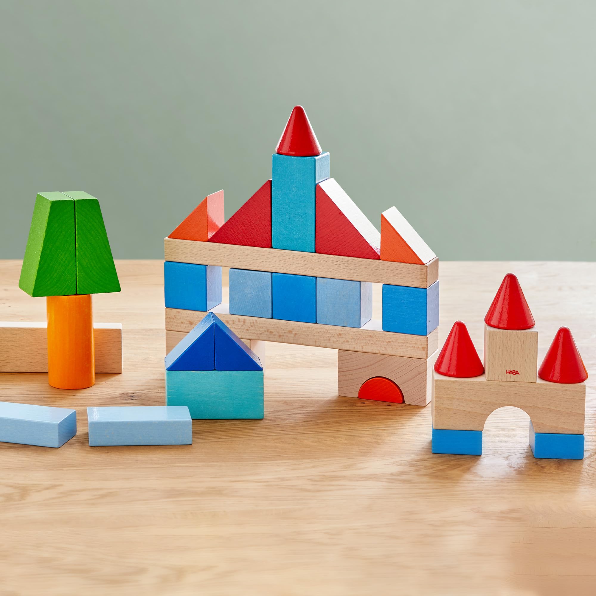 HABA Mis Primeros Bloques de construcción – 46 Bloques de Madera de Colores con Bolsa de algodón – Fabricado en Alemania – para niños a Partir de 1 año – Promueve la motricidad Fina – 2010877001