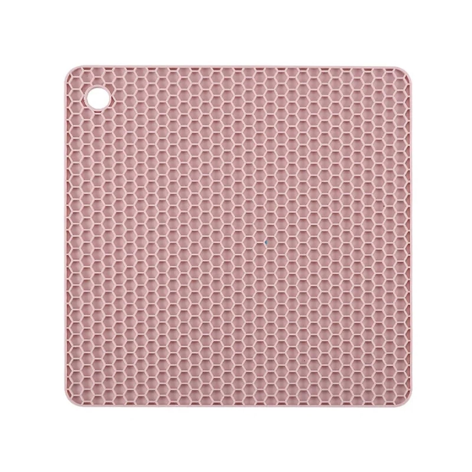 Napperon en nid d'abeille silicone rose et tapis de cuisine isolé