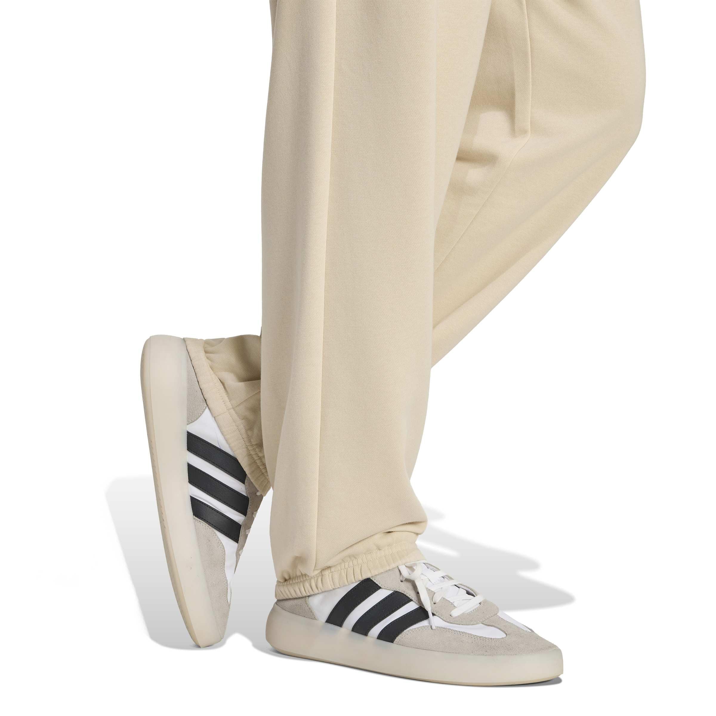 Adidas Męskie spodnie dresowe Seasonal Essentials Collegiate French Terry z mankietami