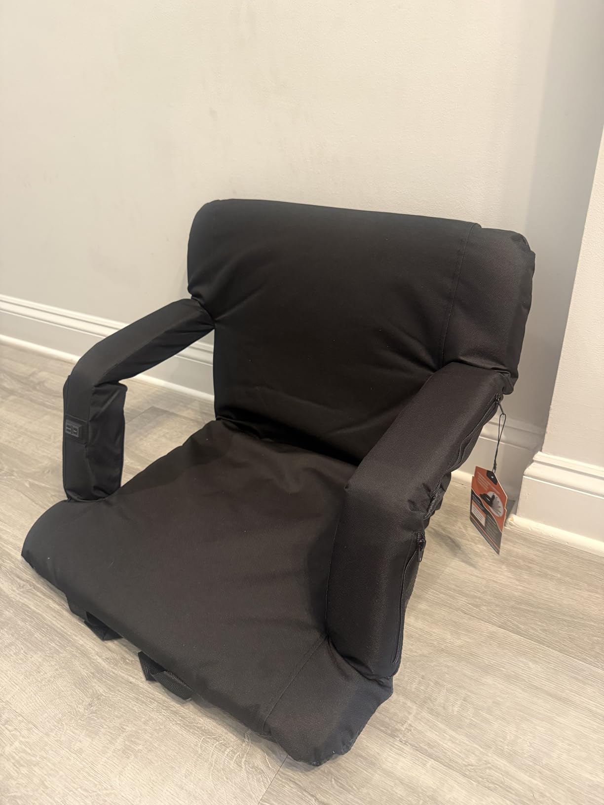 Customer photo showing the back of the stadium seat