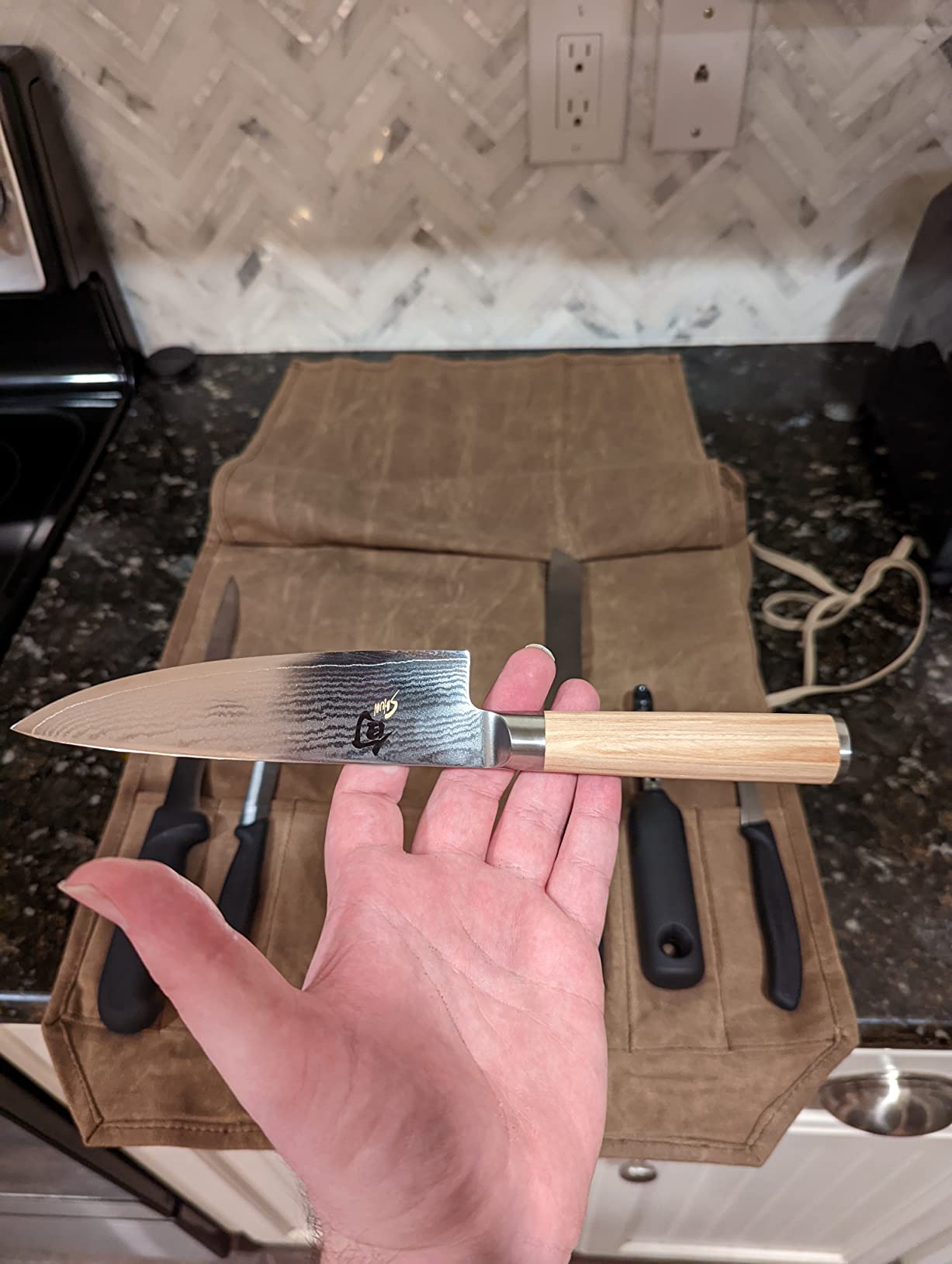 Shun Classic chef knife blade close up