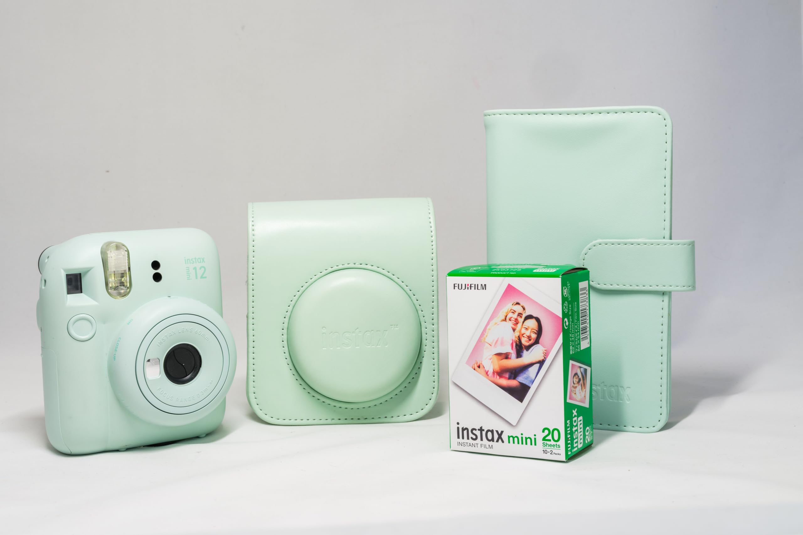 Instax Fujifilm Mini 12 Instant Camera, Mint Green Bundle with Case, Album, and White 20 Pack Film