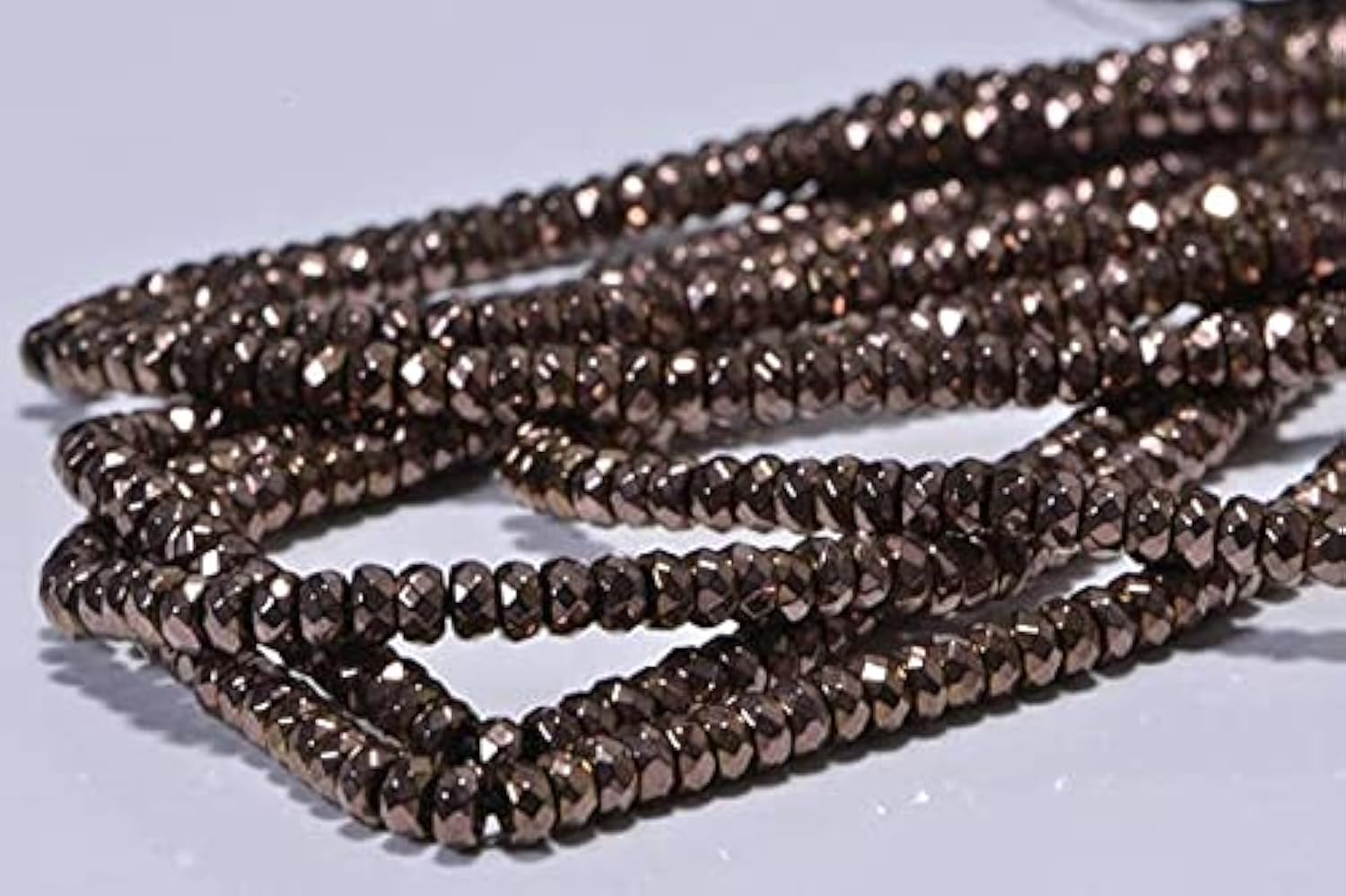 Perles hématite de qualité supérieure facettées pour bijoux fins