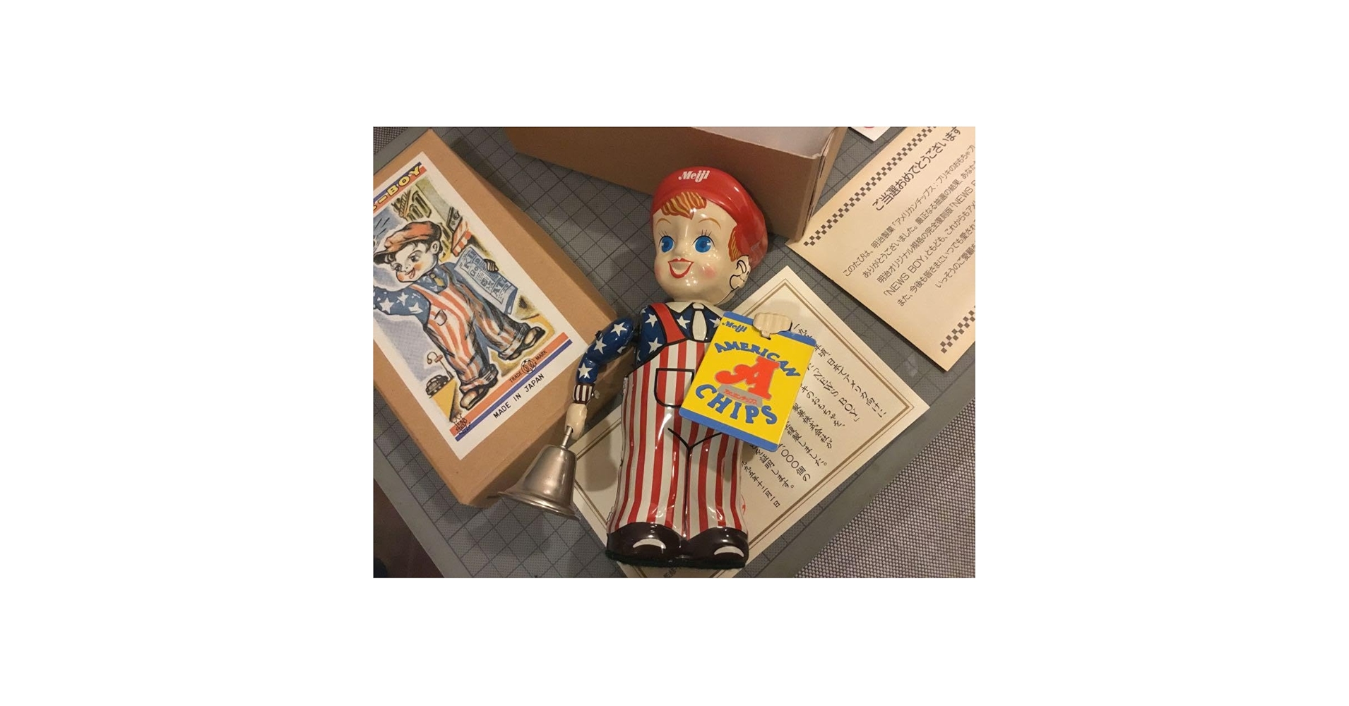NEWS-BOY ニュースボーイ　ブリキのゼンマイ人形　復刻版 Amazon.co.jp: 明治製菓 NEWS BOY ブリキ 人形 日本製 ニュース