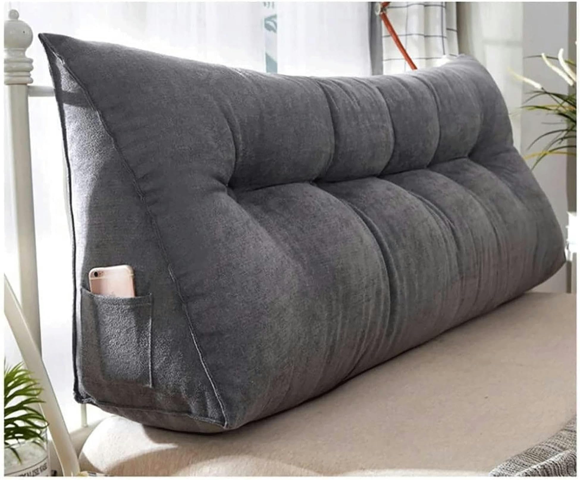 Soulagez votre dos avec le coussin triangulaire de support de lit
