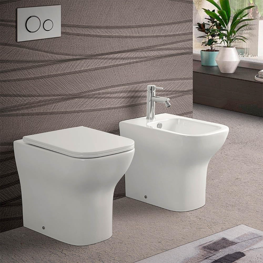 Wc singolo filomuro senza brida bianco lucido, scarico multiplo a parete o a pavimento, fissaggi inclusi, PLANA