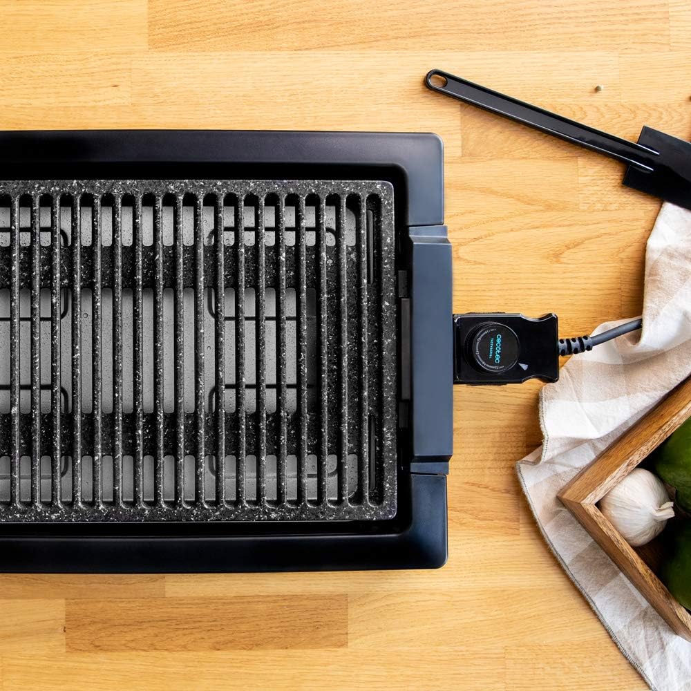 Cecotec Piastra elettrica TastyGrill 2000 Inox LineStone 2000 Finiture in acciaio inox, termostato regolabile, superficie grill, rivestimento Rockstone, lavabile in lavastoviglie Cecotec Piastra elettrica TastyGrill 2000 Inox LineStone 2000 Finiture in acciaio inox, termostato regolabile, superficie grill, rivestimento Rockstone, lavabile in lavastoviglie