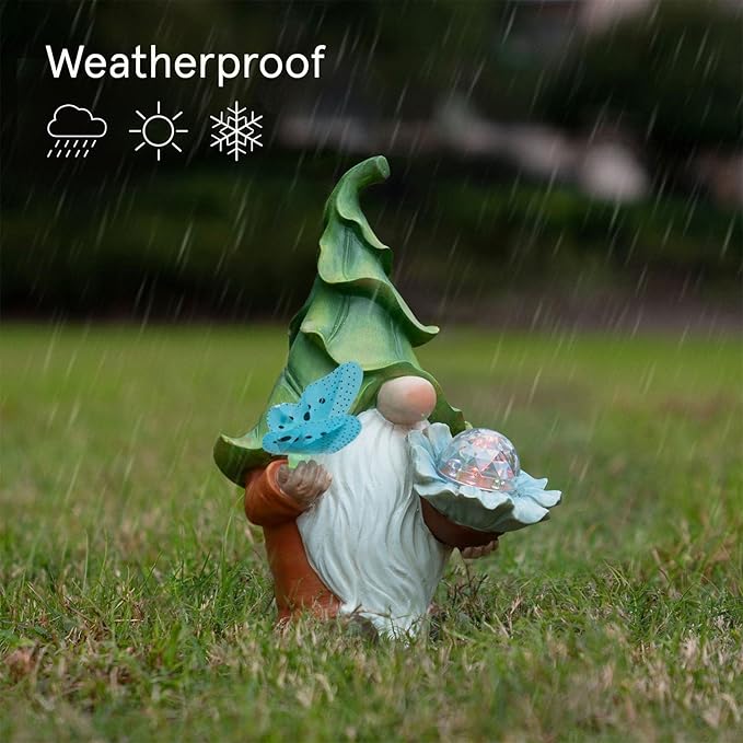 LA JOLIE MUSE 11.6'' Solar Gnomes Garden Statues are charming outdoor decorations that feature a gnome figurine holding a magic orb and a butterfly. Made of durable resin, these statues are weather-resistant and suitable for display in yards, patios, lawns, and porches. The built-in solar lights automatically illuminate the statues at night, adding a whimsical touch to any outdoor space.