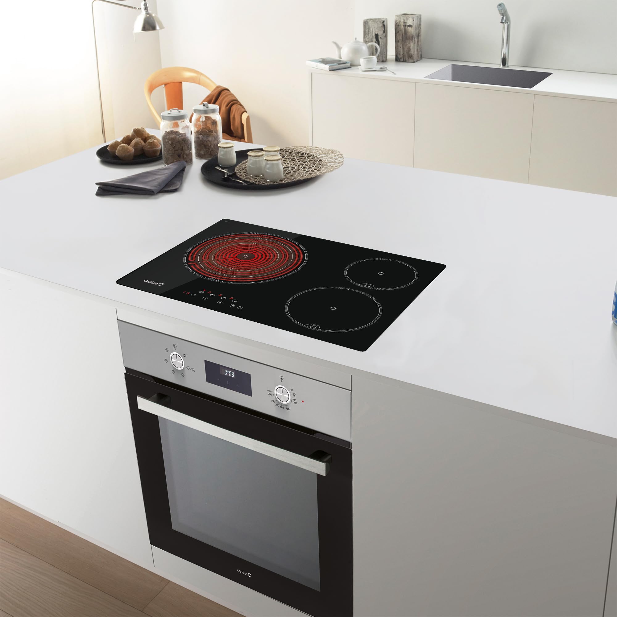 Cata | Placa de inducción | Modelo TT 5003/G | 3 Zonas de Cocción | Placa con 9 Niveles de Potencia Regulables + Booster | Ancho de 59cm | Acabado en Color Negro