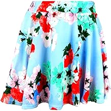 Dise&ntilde;os de moda para ni&ntilde;as grandes de Oasis en top corto/falda skater, estampados de tart&aacute;n grafiti