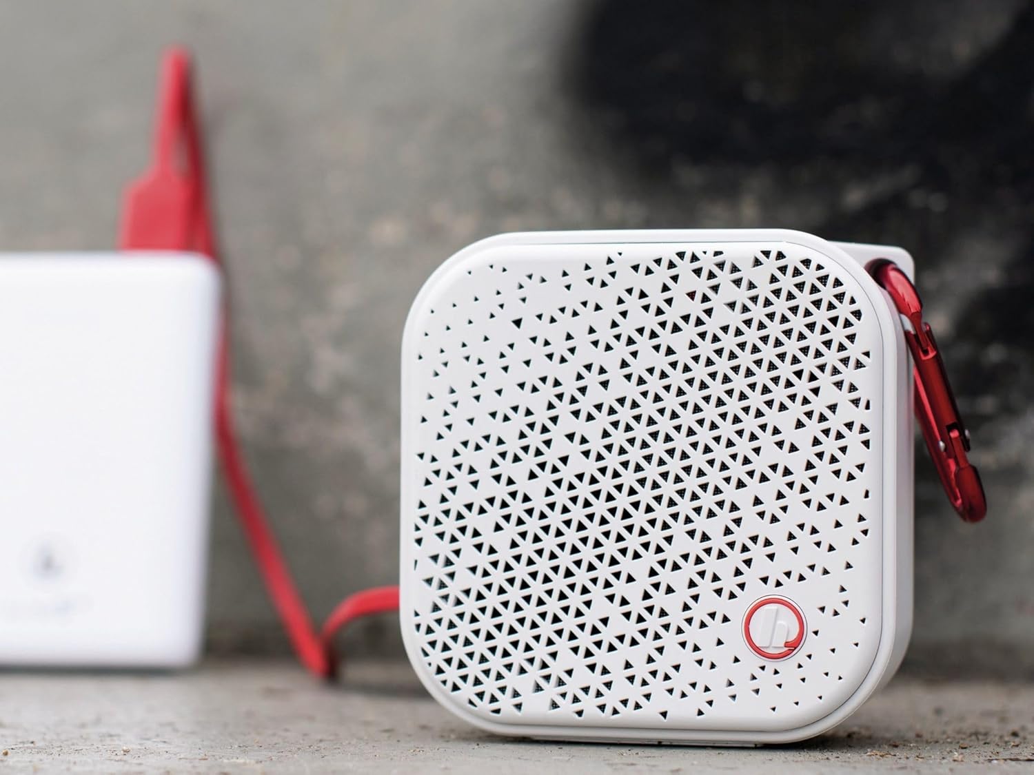 Hama Bluetooth Pocket 2.0 speaker connected to a power bank via USB cable