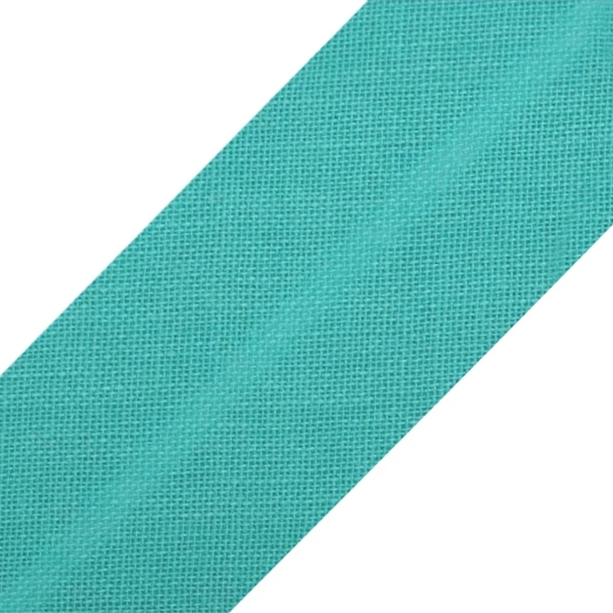 Biais couture coton turquoise 20 mm résistant et souple pour border un coussin de salon