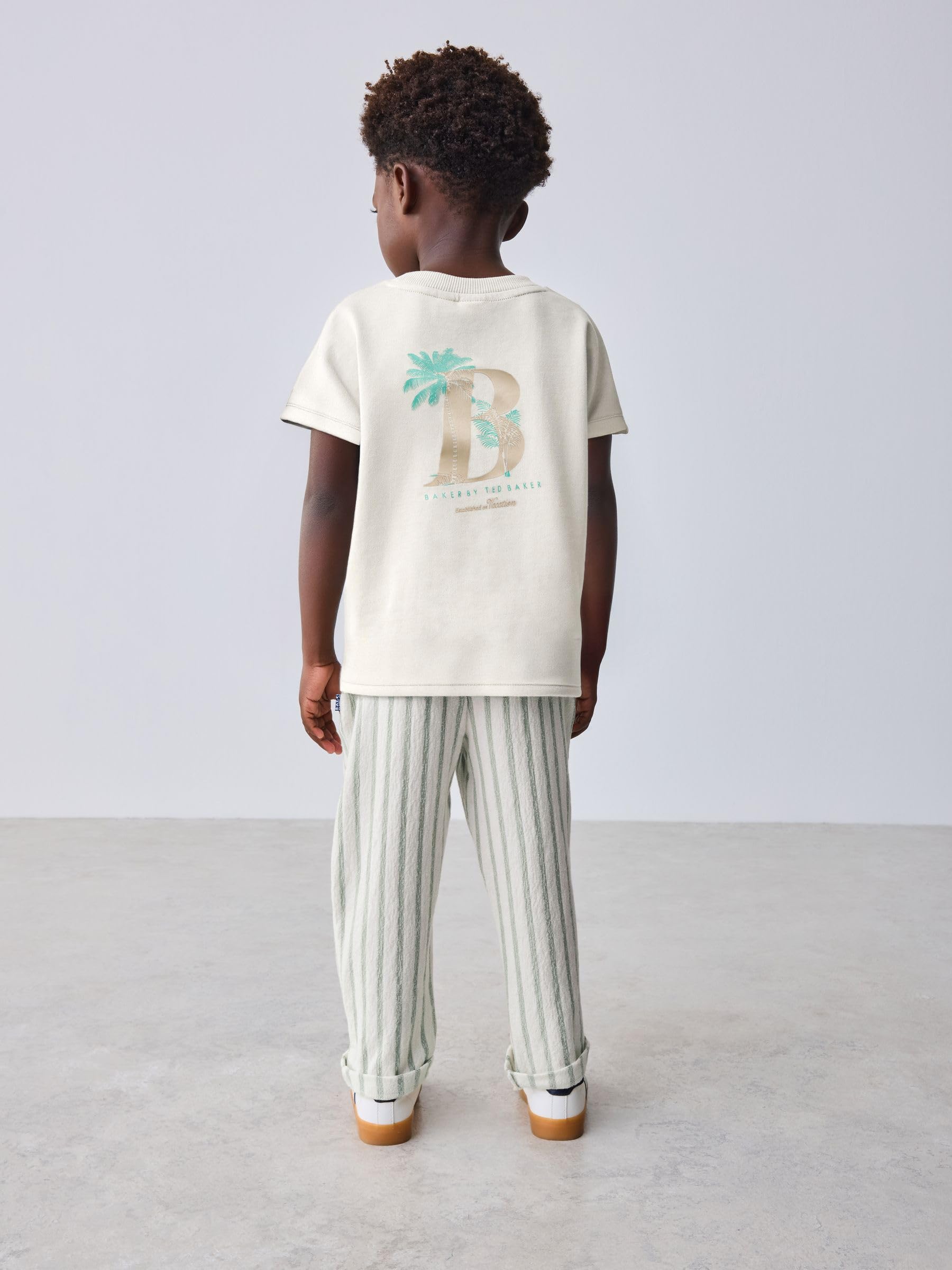 Baby Jungen Grafik-T-Shirt und gestreifte Hose im Set