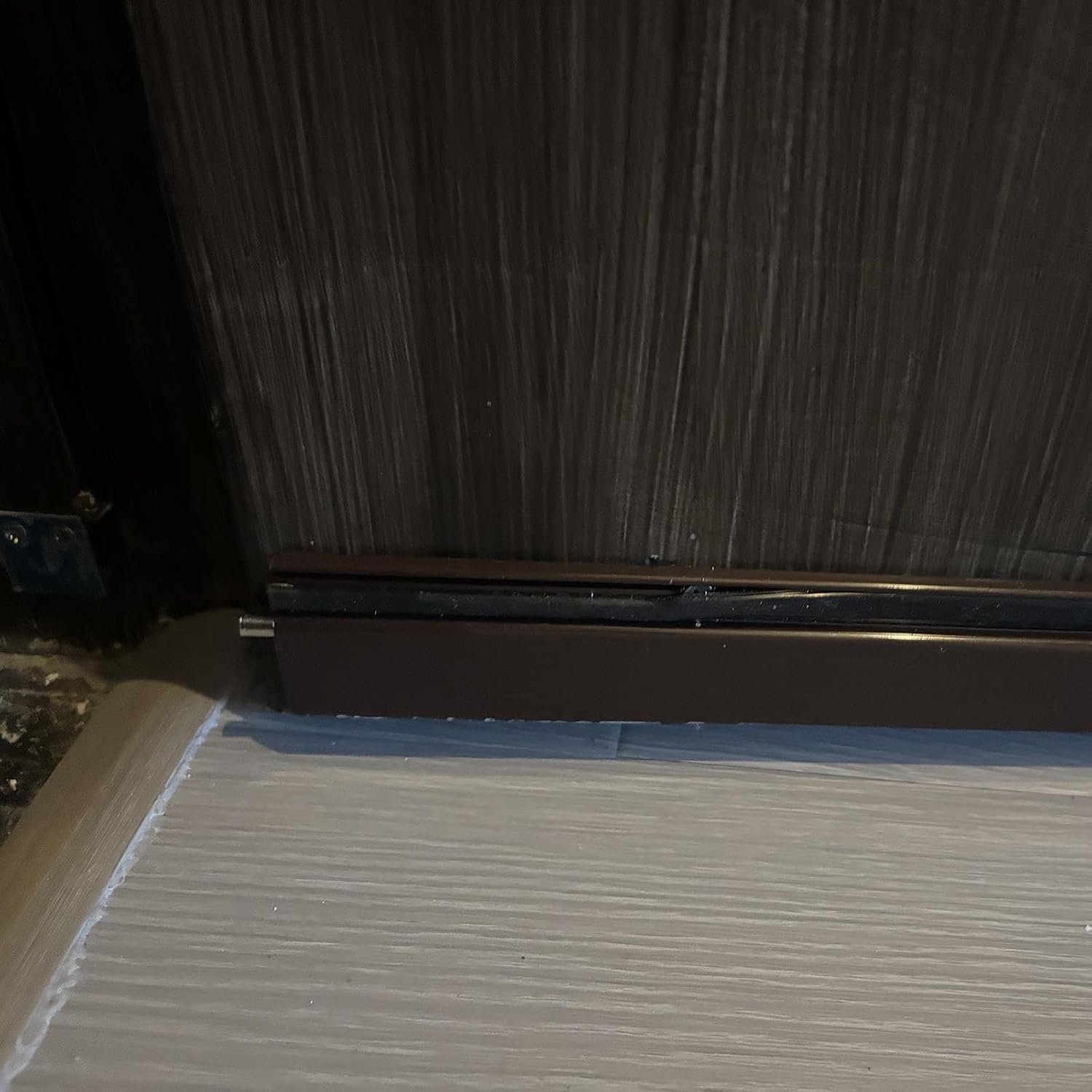Brown Self-Adjusting Aluminum Under Door Weather Stripping, Draft Blocker