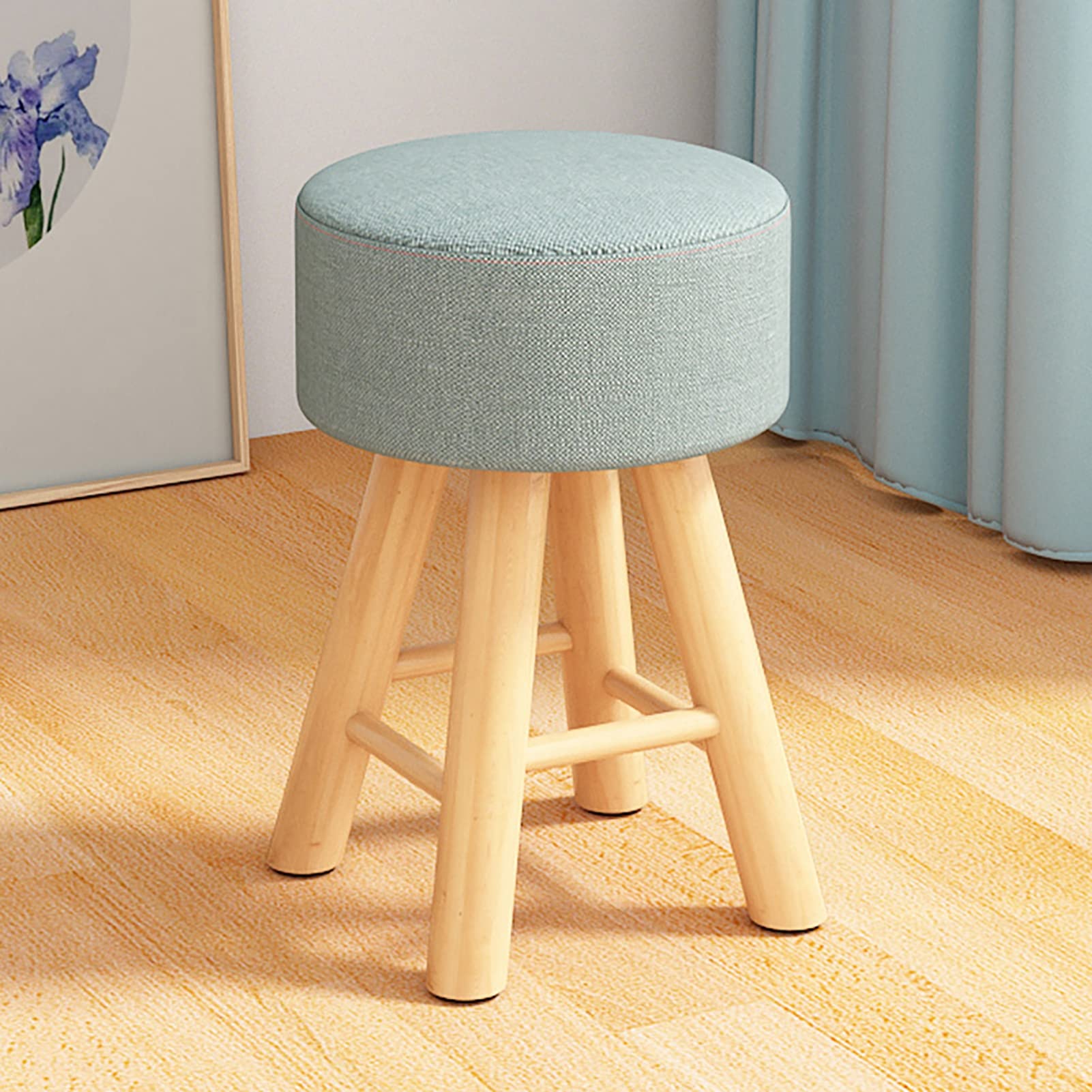Tabouret repose-pieds vert pour un coin lecture chaleureux et relaxant