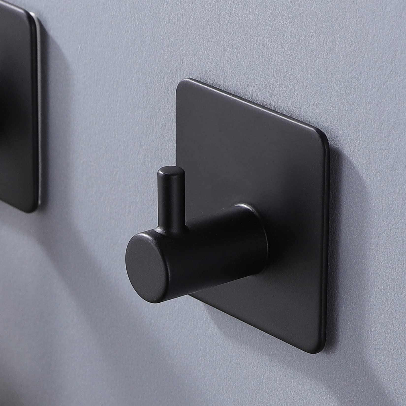 ZUNTO Ganci Adesivi Ganci Portasciugamani Senza Foratura Gancio asciugamano con Acciaio Inox Gancio Appendiabiti per Cucina e Bagno, Nero（4 Pezzi