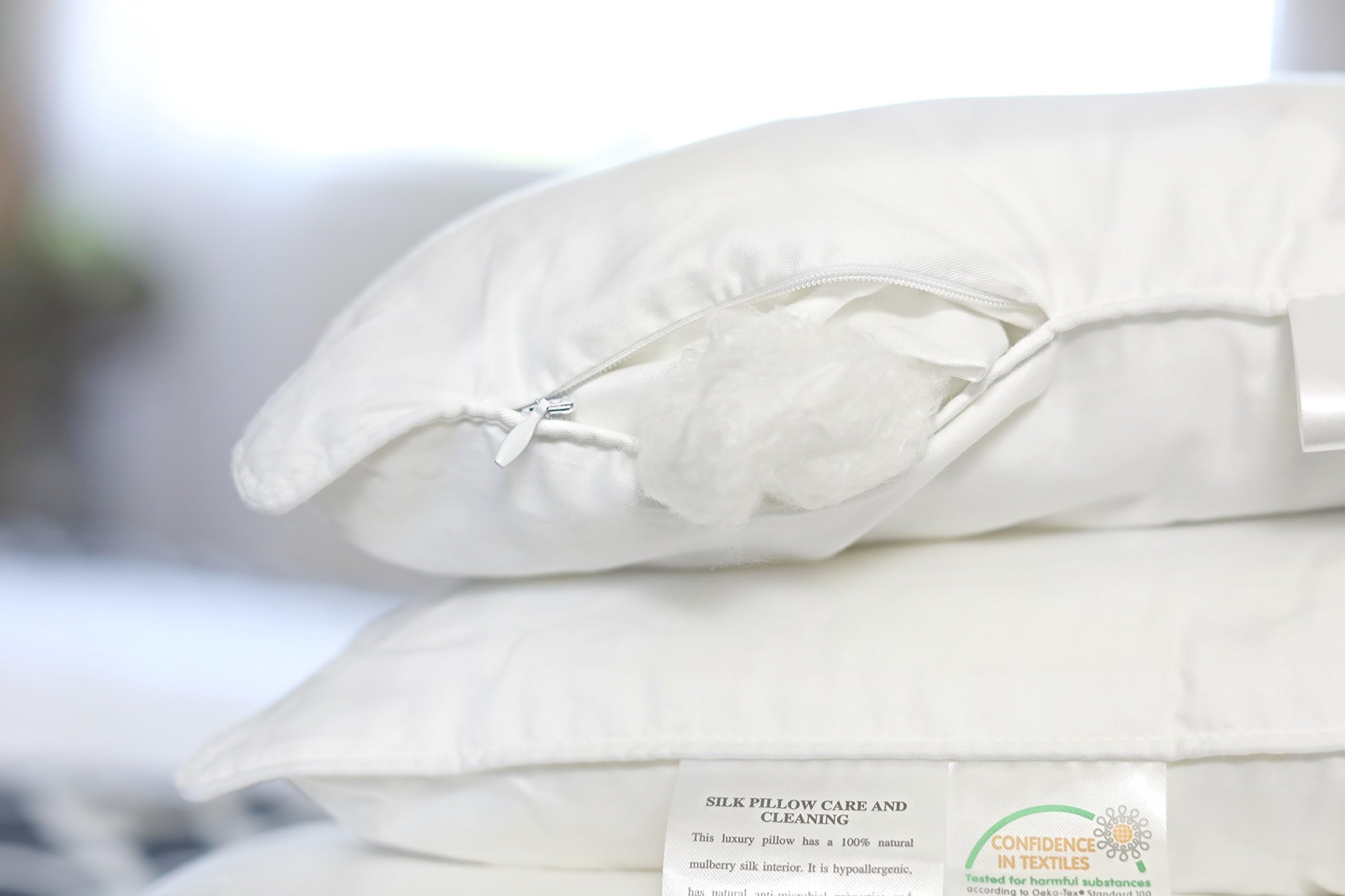 Silk Bedding DirectPair of Luxury Mulberry Silk-Filled Pillows. 100% Natural and Hypoallergenic. Short, 58cm x 38cm / 23" x 15". To Rest Your Dreams on Pure Mulberry Silk.