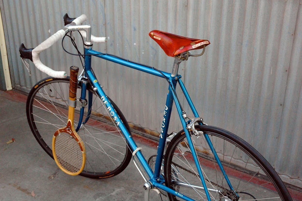 RETRO STYLE TENNIS RACKET HOLDER CLIP FITMENT FOR A BIKE,CARRY A TENNIS RACKET ON YOUR BIKE NOS IDEAL FOR VINTAGE or CLASSIC BIKE
