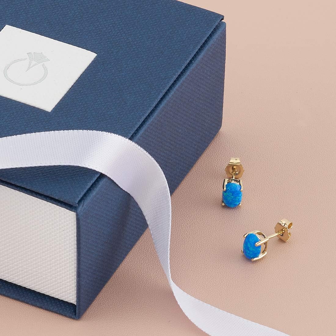 Peora 14K Yellow Gold Created Blue Fire Opal Earrings for Women, Classic Solitaire Studs, 7x5mm Oval Shape, 1 Carat total, Friction Back, October Birthstone Earrings, Dainty, Iridescent Earrings