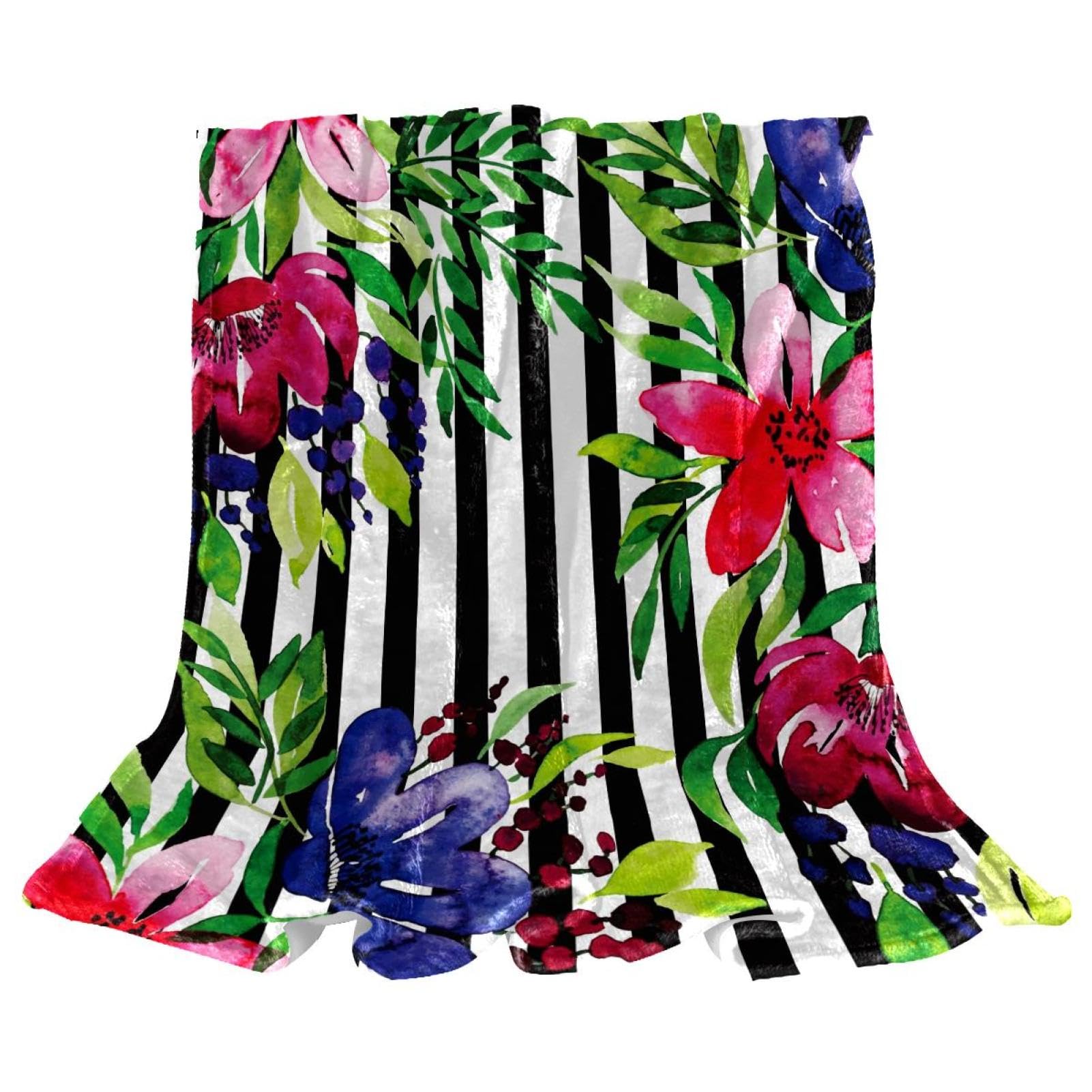 Couverture polaire fleur tropicale pour cocooning réussi sur le canapé du salon en hiver