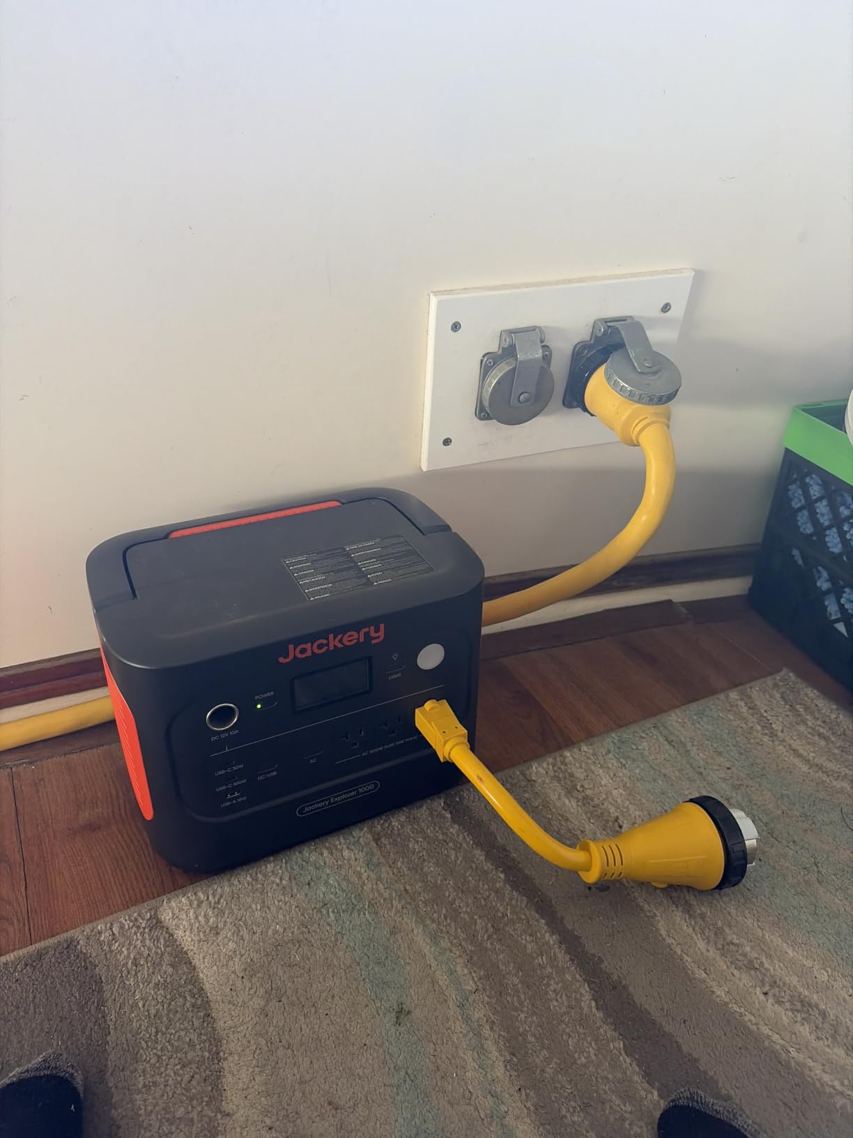 Jackery Explorer 1000 v2 portable power station on a camping table