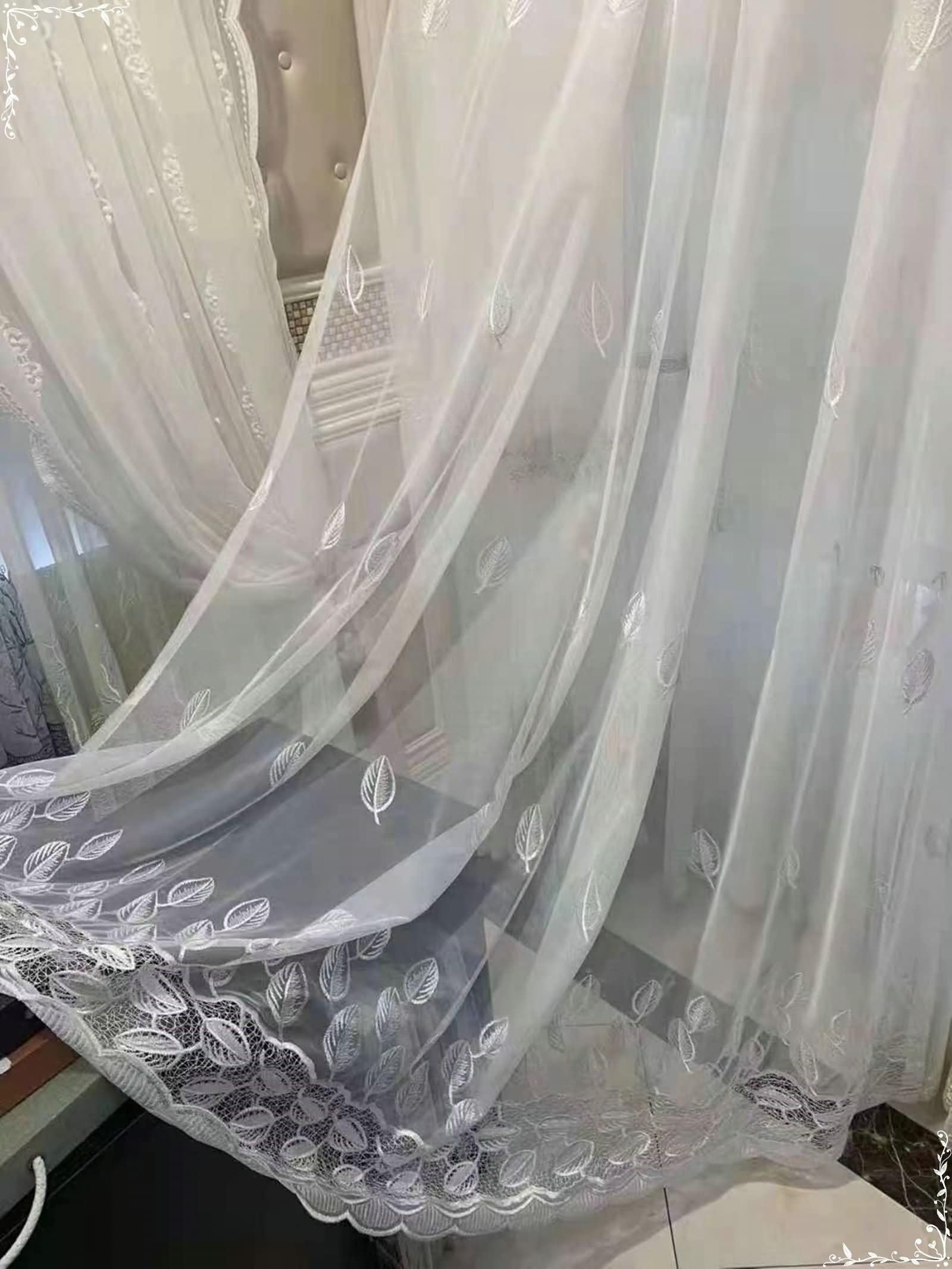 Voilage lot de 2 blanc Beydodo pour tamiser la lumière du salon avec élégance naturelle