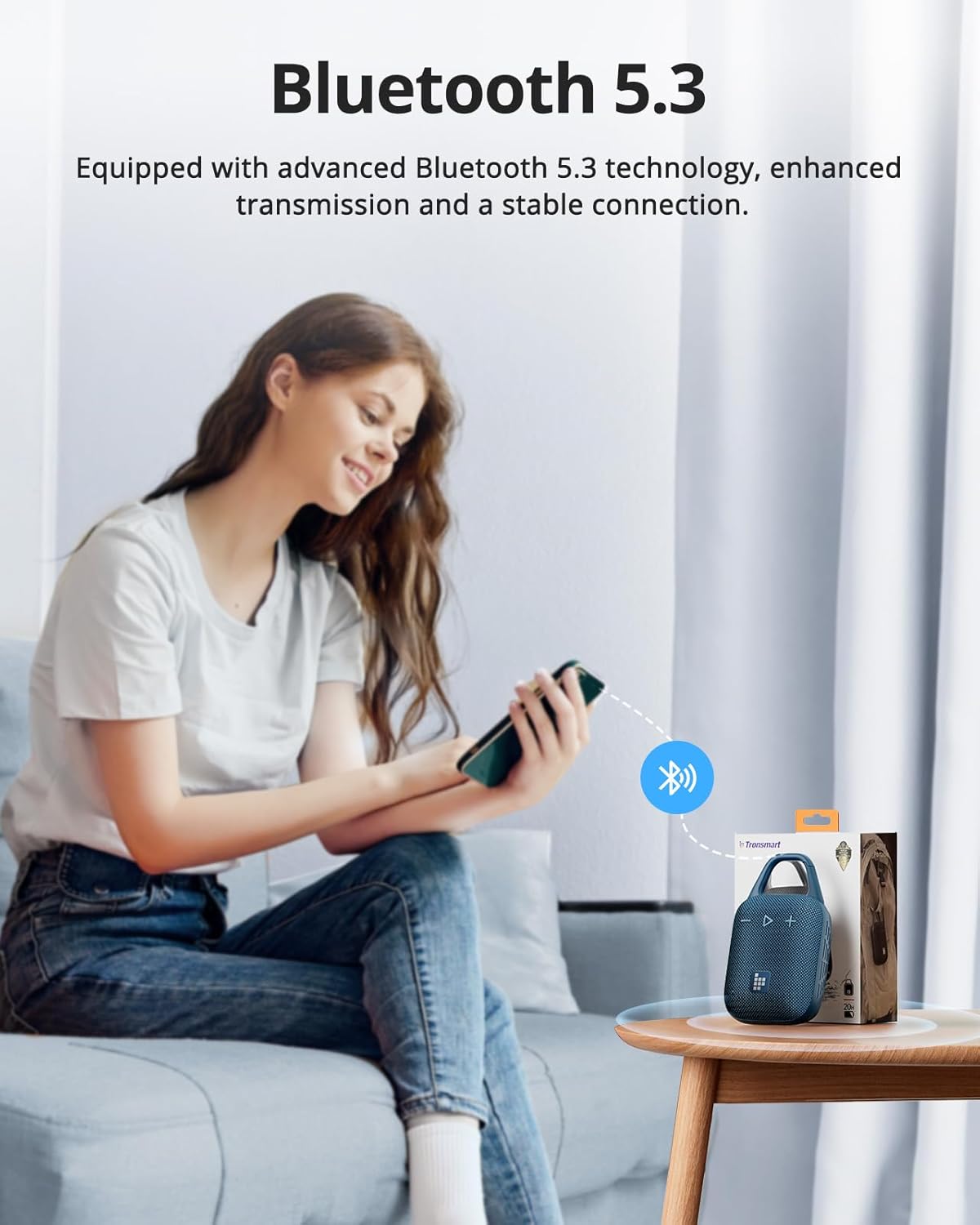 A person connecting their smartphone to a Tronsmart Mirtune H1 speaker via Bluetooth 5.3.