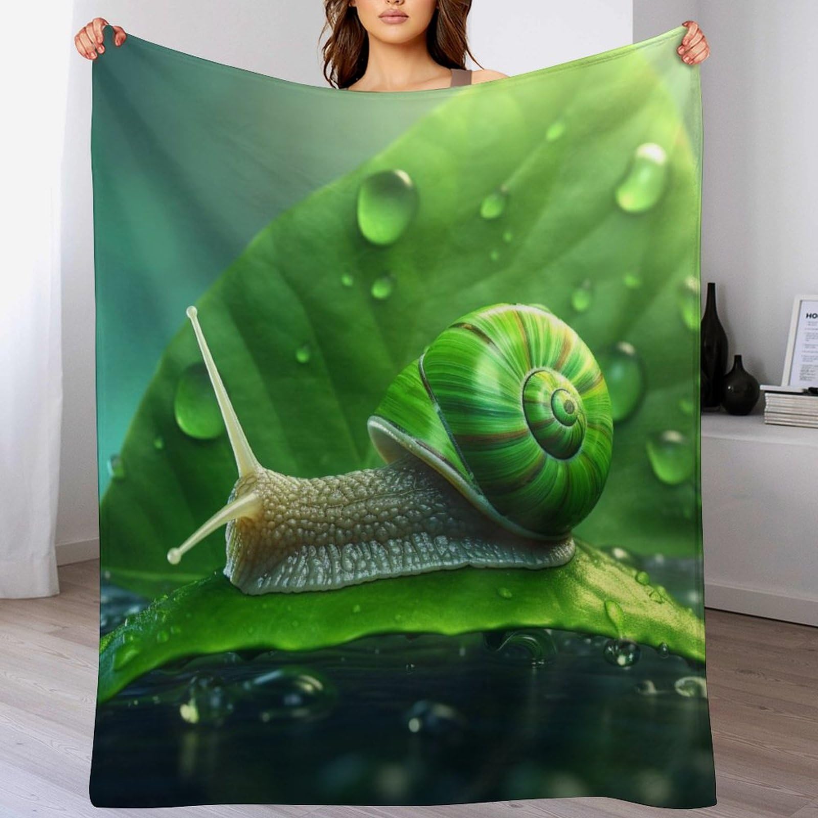 Couverture polaire escargots 180x200 pour s'envelopper de douceur sur le canapé