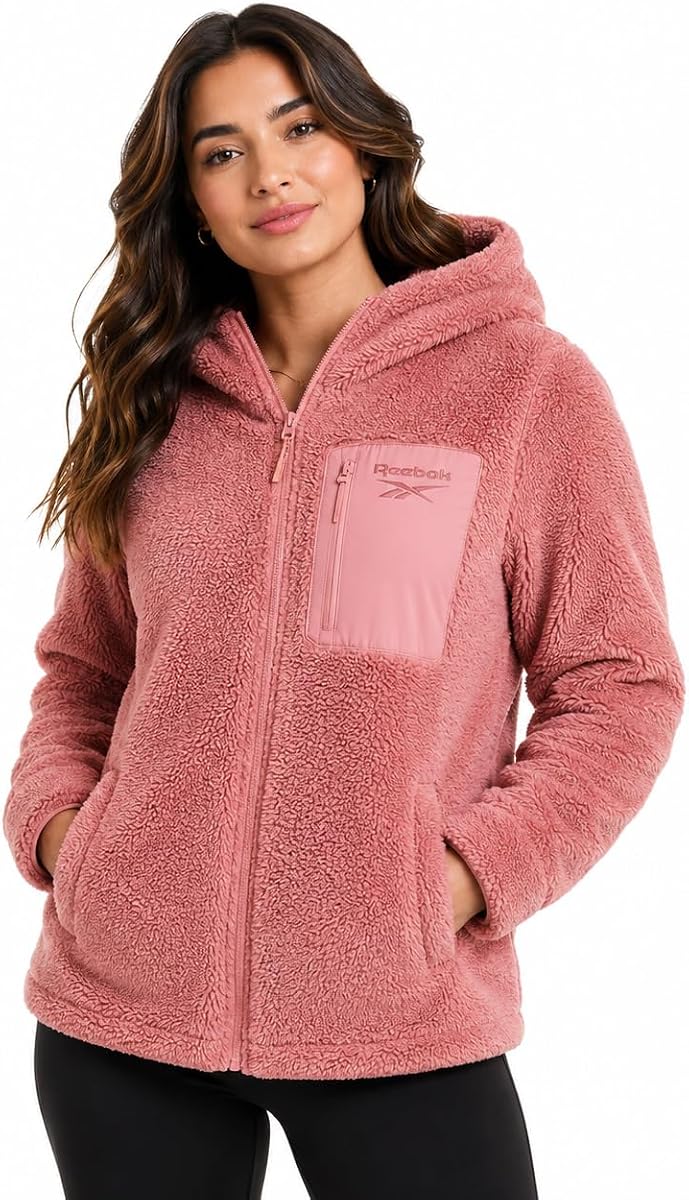 Reebok Chaqueta polar Sherpa para mujer Abrigo de invierno con capucha y cremallera para mujer | Acogedor abrigo de peluche de piel de Sherpa con textura para mayor calidez, chaqueta de Sherpa suave, ropa de abrigo para mujer, versátil para recados, fines de semana, gimnasio