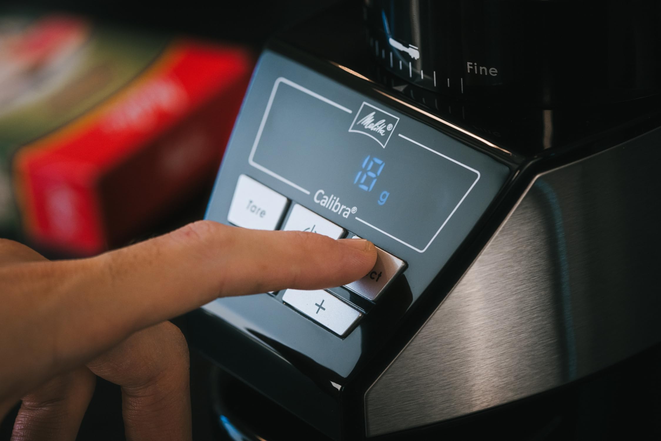 Melitta Calibra Kaffeemühle - Elektrische Kaffeemühle mit Kegelstahlmahlwerk für bis zu 375g Kaffeebohnen und integrierter digitaler Waage, 39 individuellen Mahlstufen, schwarz/Edelstahl