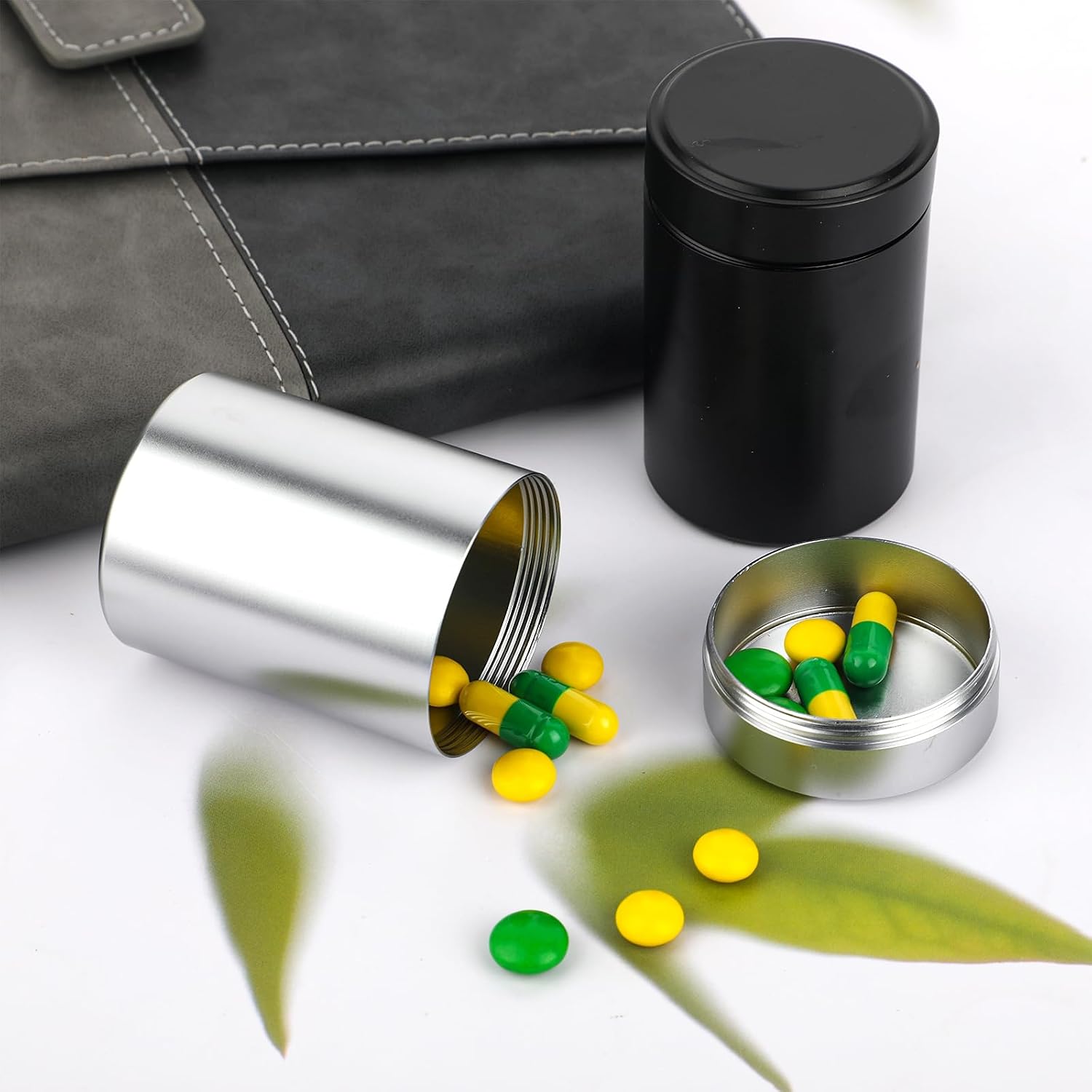 COMNICO 2pcs Portable Metal Pill Organizer, Round Daily Pill Box Holder Pocket Small Pill Case Medicine Organizer Vitamin Bottle Containers for Traveling Outdoor Fish Oils Supplements (Black+Silver)