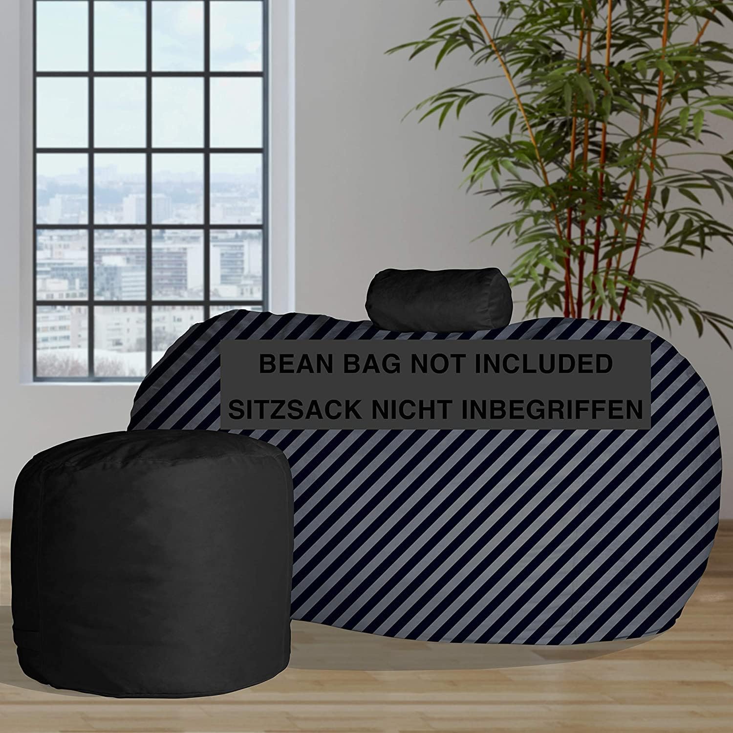 Charlie & Finn Lounge set in black onyx for the giant bean bag, comfortable neck roll and stable footstool for the ultimate sitting and lying comfort.