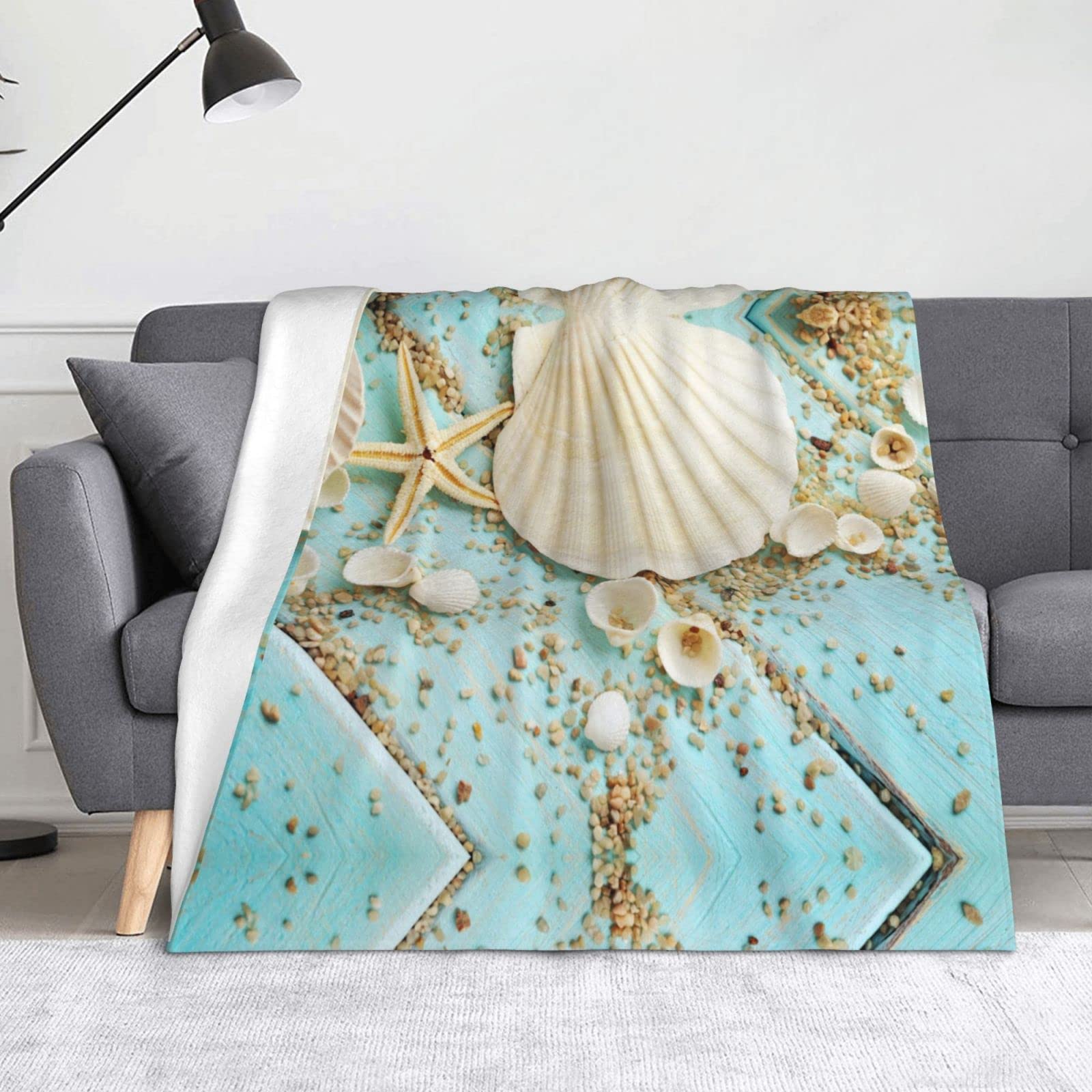 Couverture microfibre super douce bleu motif étoile de mer et lit