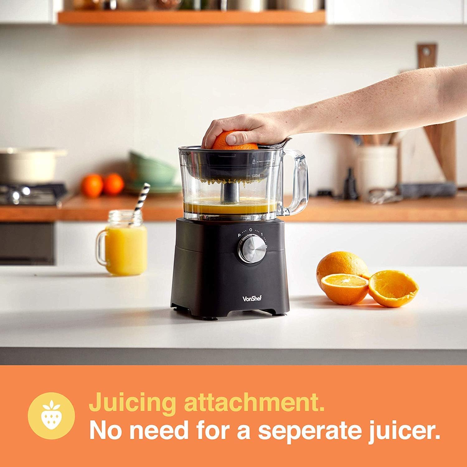 Person using the citrus juicing attachment on the VonShef Food Processor