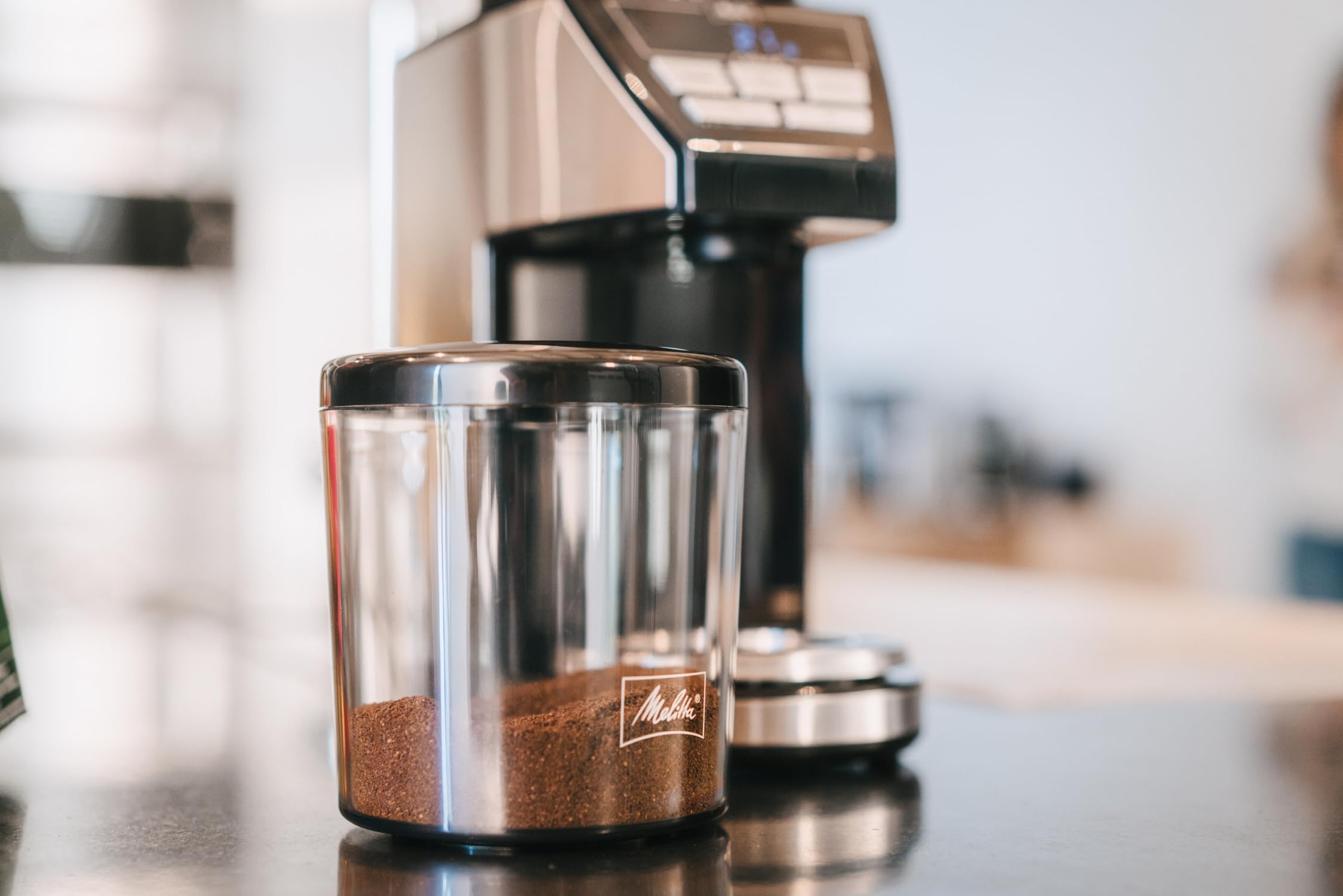 Melitta Calibra Kaffeemühle - Elektrische Kaffeemühle mit Kegelstahlmahlwerk für bis zu 375g Kaffeebohnen und integrierter digitaler Waage, 39 individuellen Mahlstufen, schwarz/Edelstahl